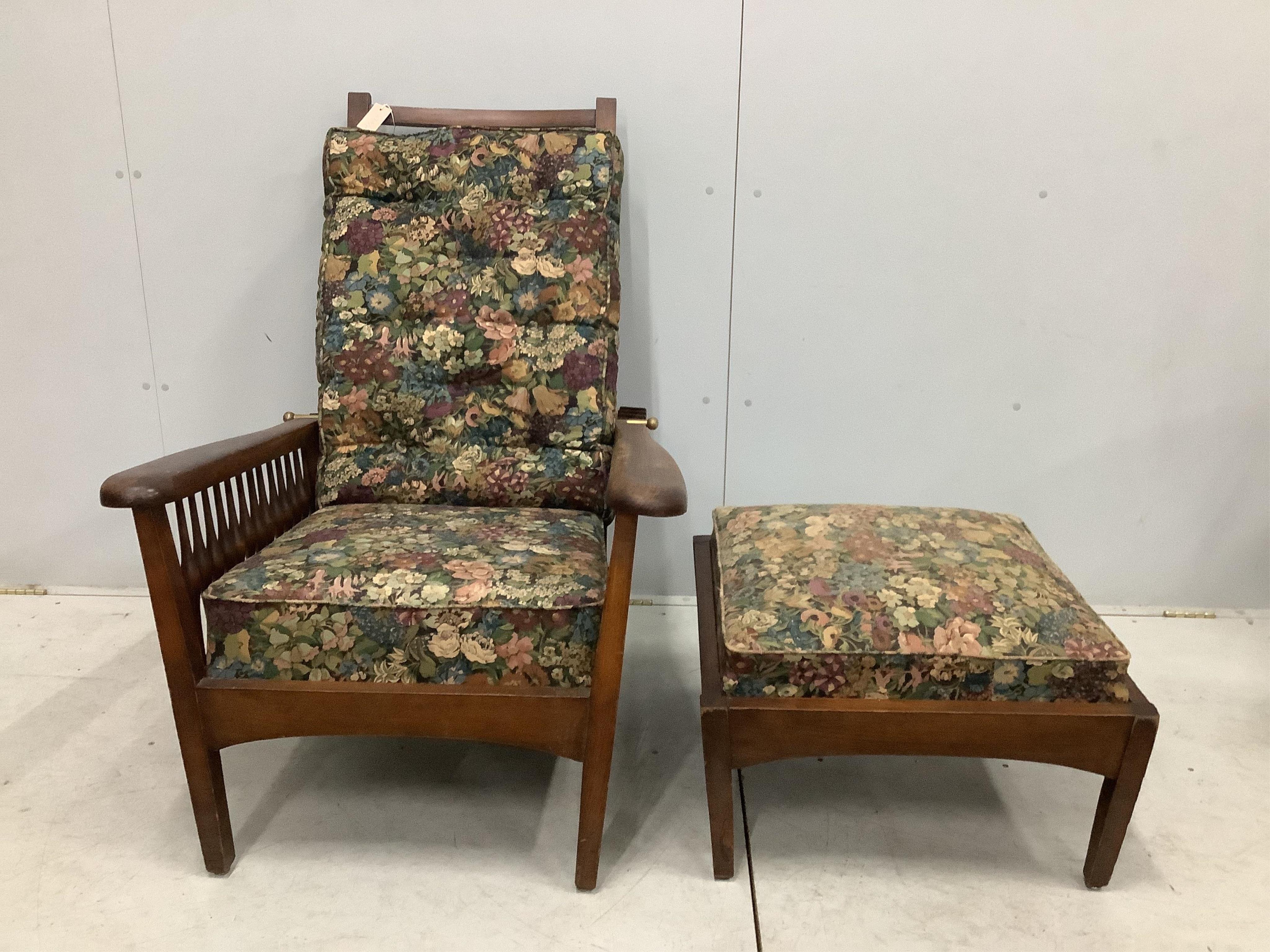 An early 20th century Morris style beech reclining armchair with a matching footstool, width 78cm, depth 92cm, height 108cm. Condition - fair